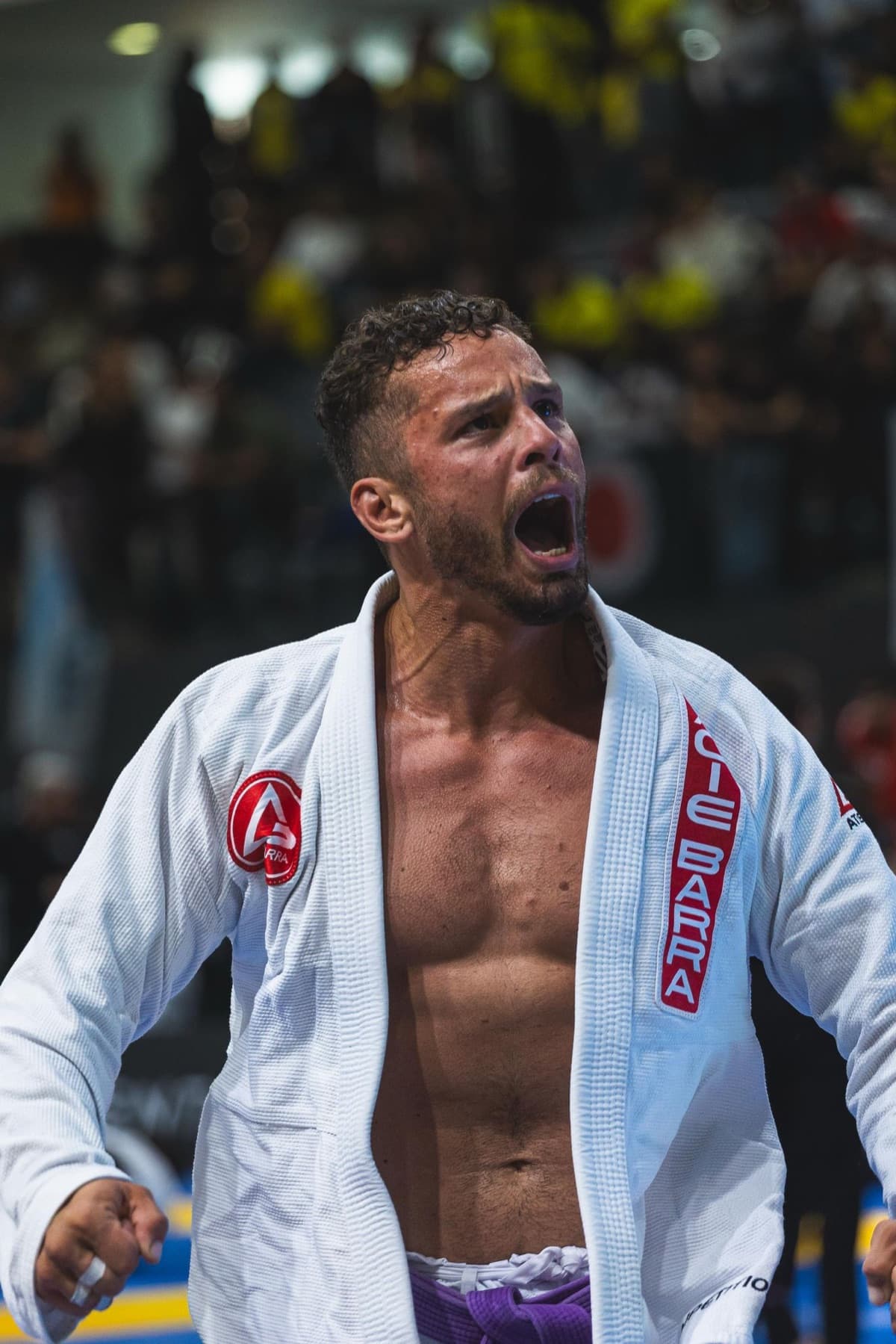 Athlete celebrating at a jiu-jitsu competition